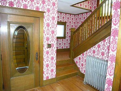 Foyer Grand foyer with beautiful natural wood trim