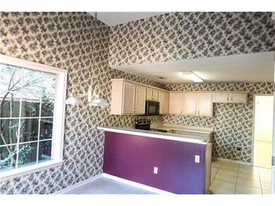 Another view of kitchen area that shows breakfast 