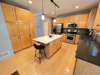 Abundance of cabinetry and quartz counter tops