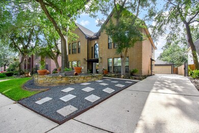 Mature trees and, easy care yard welcome guests to