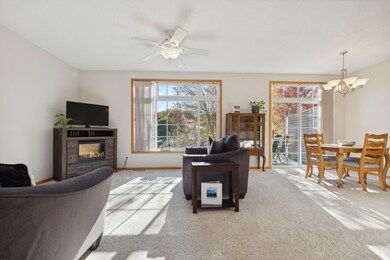 2833 Brockman Court, Northfield, MN - living room/dining areas have full view of the pond through a wall of windows