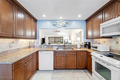 6900 Dennis Cir unit 205, Naples, FL 34104 - photo 2