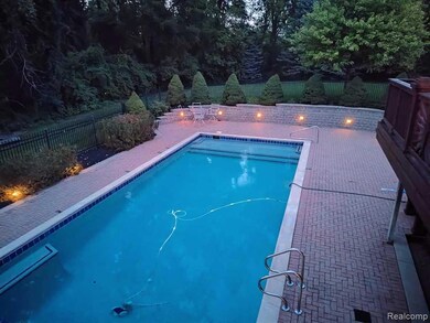View of swimming pool with a fenced backyard and a patio area