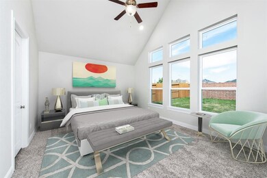 Cathedral ceiling in master and large window display