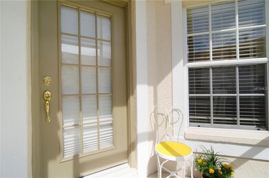 Covered screened in front entry allowing the breez