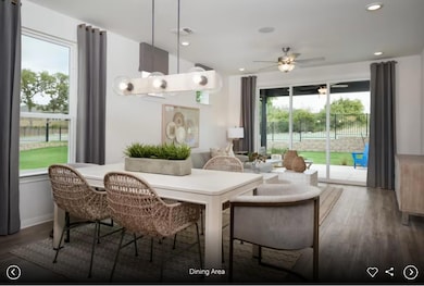 Interior photos- Photo of Del Webb model home with same floor plan, not of actual home listed.