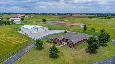View of rural area featuring agricultural land, great view of the home & barn on 7.5 acres.  Riding arena is located on a separate 12.5 acreage that is for sale, please contact the Listing Agent for details!