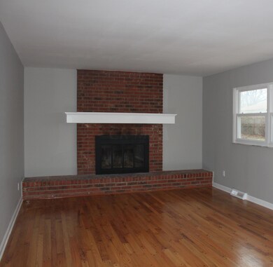 Family Room w/Wood Burning Fireplace