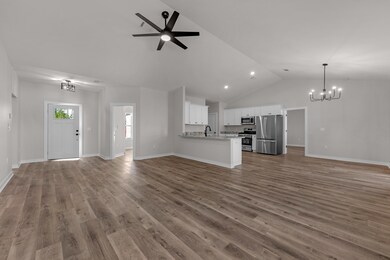 Vaulted Ceiling with LVP Flooring!