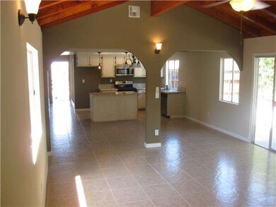 Family room view to dining area and kitchen.