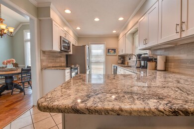 Kitchen featuring appliances with stainless steel 