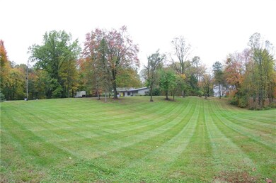 Nearly 3 acres on a corner lot!