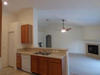 Kitchen view into family room