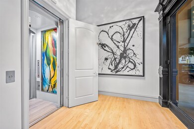 First Floor Entry with View of Elevator