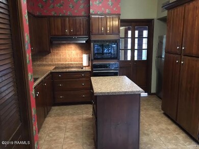 Kitchen view toward dining 7-1-2019
