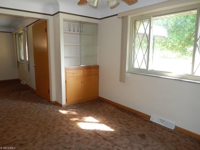 Formal Dining room with built-in china cupboard.