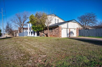 View of front of home featuring concrete driveway,