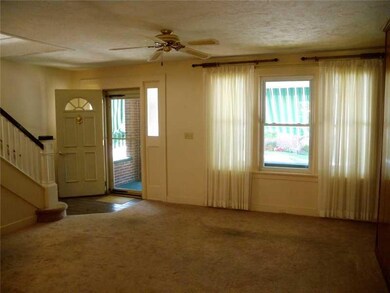 Living Room. The large windows add lots of light t
