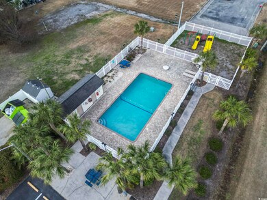 Drone / aerial view of a pool area