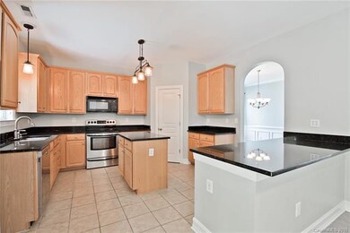 Spacious kitchen allows more than one work on prep