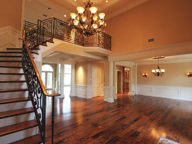 Entry/Foyer. Showcase entry -dramatic staircase wi