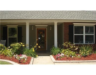 Photo. ANOTHER CLOSER VIEW OF FRONT, PORCH, GARDEN