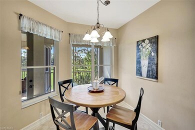 Dining space with baseboards and a chandelier