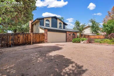 Oversized driveway for extra parking and access to