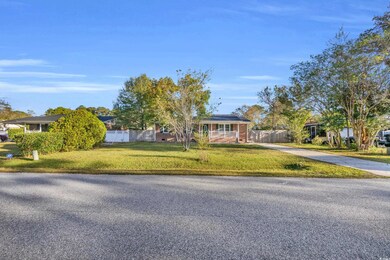 Ranch-style house with a front lawn