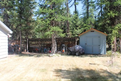 Small storage shed included