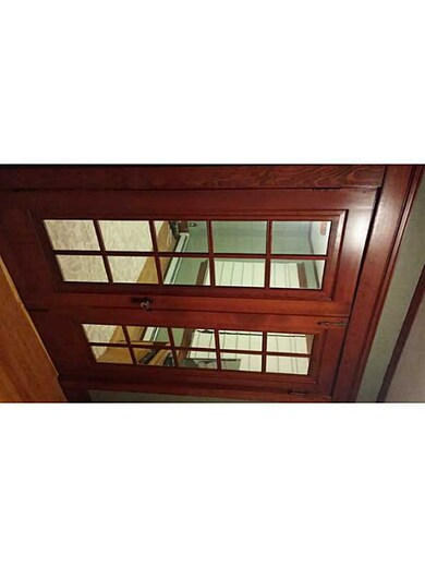 Living Room. Front sunroom has french doors leadin