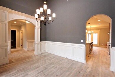 Formal Dining Room With Access To Kitchen