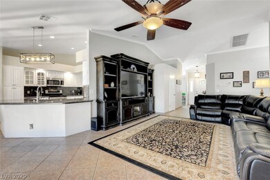 Family room with entertainment center, adjacent to
