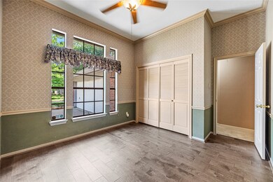 This versatile study or flex space features wood-l