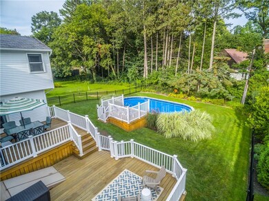 Entertainment-sized tiered deck and fully fenced b