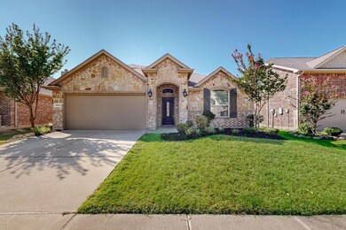 View of front of house featuring a garage and a fr