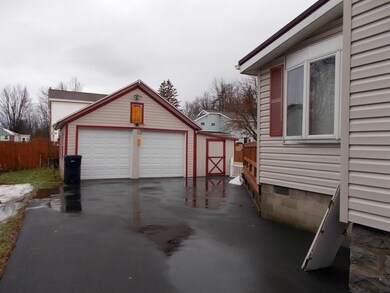 Two car+ garage with extra storage area.