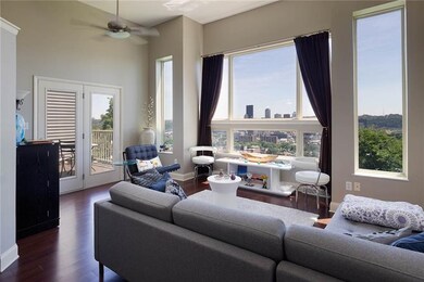 Check out that VIEW!! The wall of windows in the l