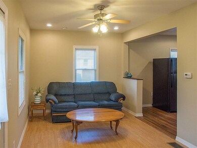 Sectional couch would fit well in the corner of th