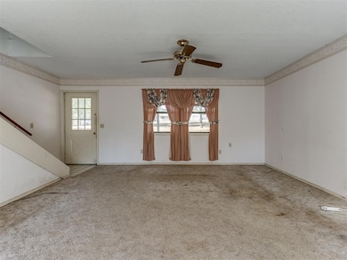 Alternate view of front living room with view of f