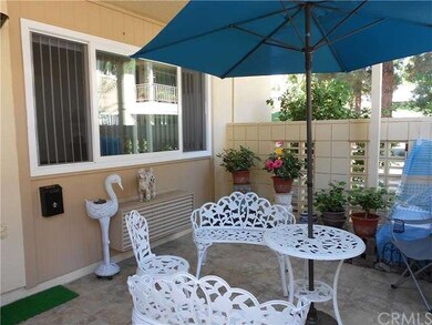 Tiled patio with room for a BBQ, table and chairs