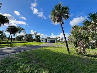 View of yard featuring a garage