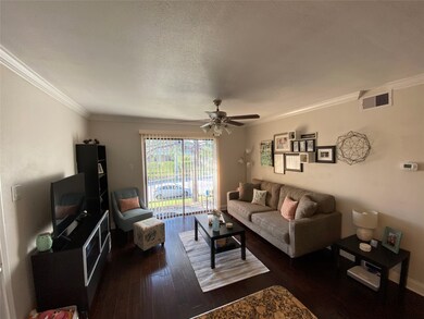 Another view of living room and balcony.