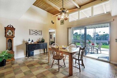 Large informal dining is off the kitchen and bathe