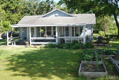Front view of open and screened porch