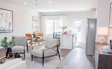 Living room featuring dark wood-type flooring, bas