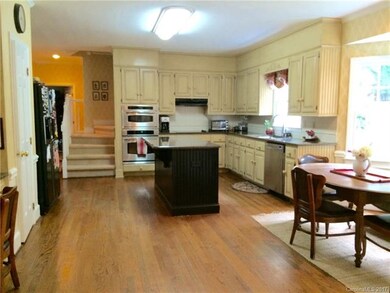 Kitchen, along side back stairs is small hallway l