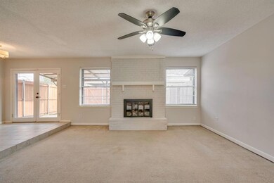 Family room. Wood burning fireplace.
