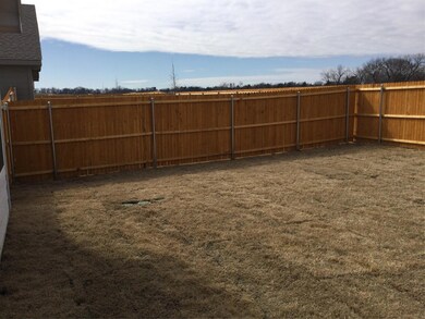 Back yard is completely fenced and sodded.  Sprinkler system to make watering easier.