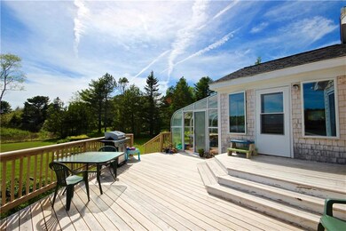 Deck looking into solarium and kitchen
